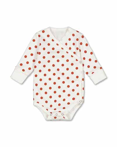 White wrap-around bodysuit with long sleeves, pattern with red dots.
